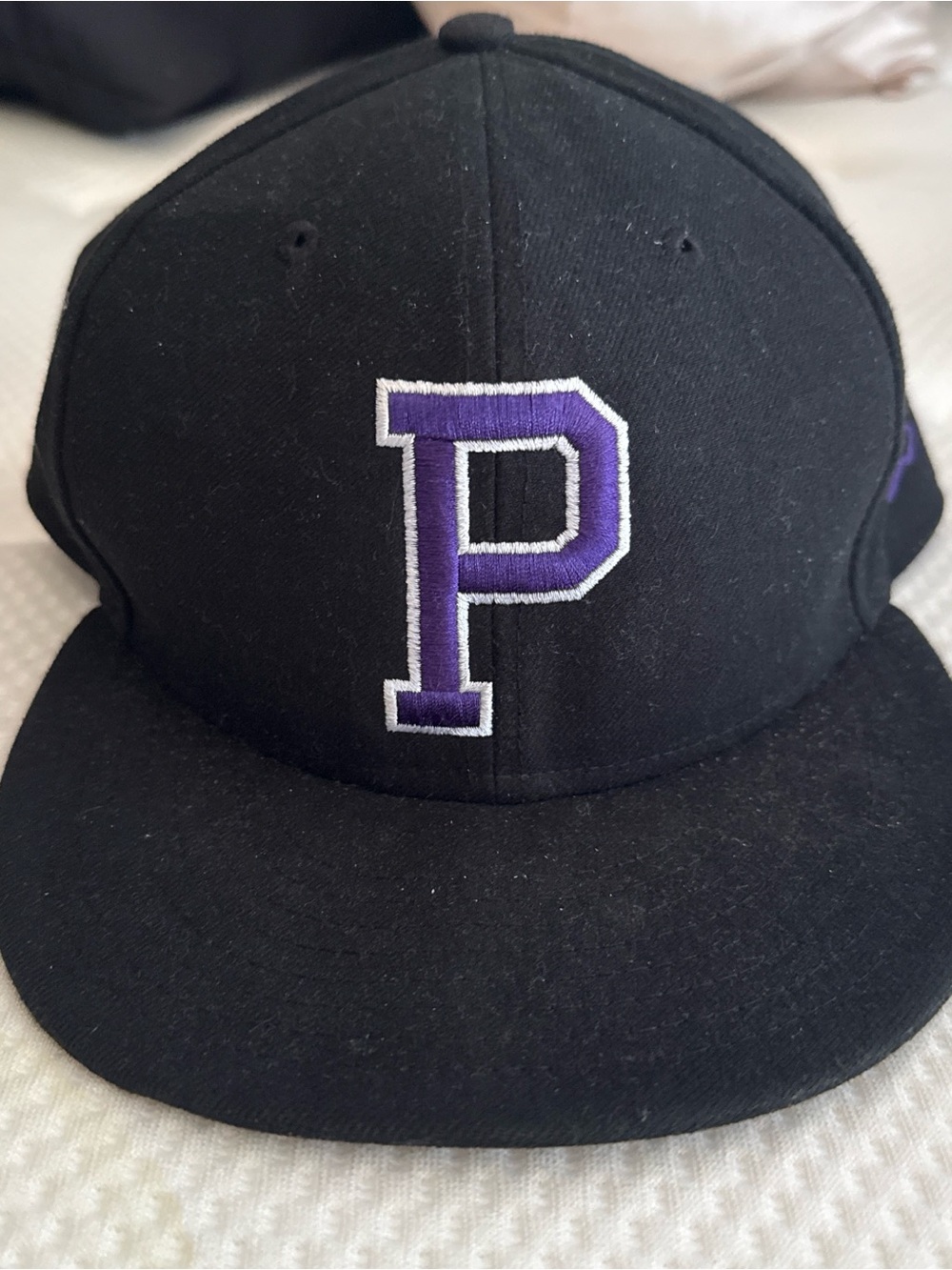 New Era Black 9FIFTY Snapback Cap with White Logo Details